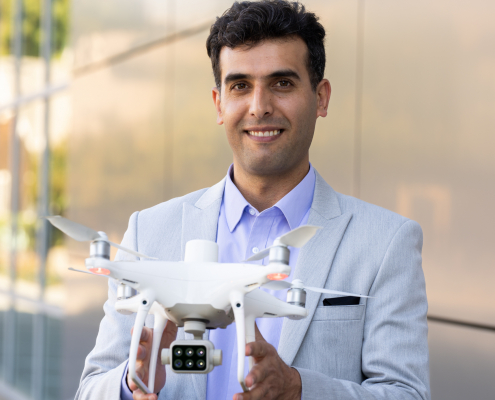 Hamid Jafarbiglu posing with drone