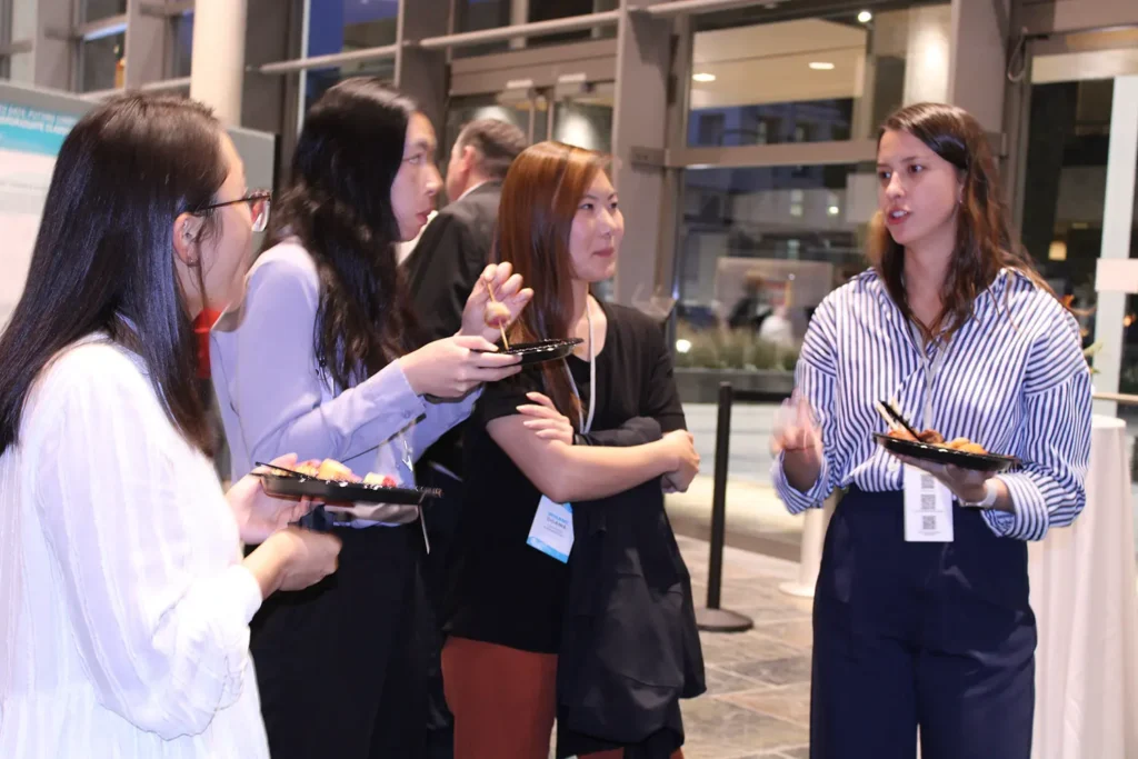 Women standing and talking at an event