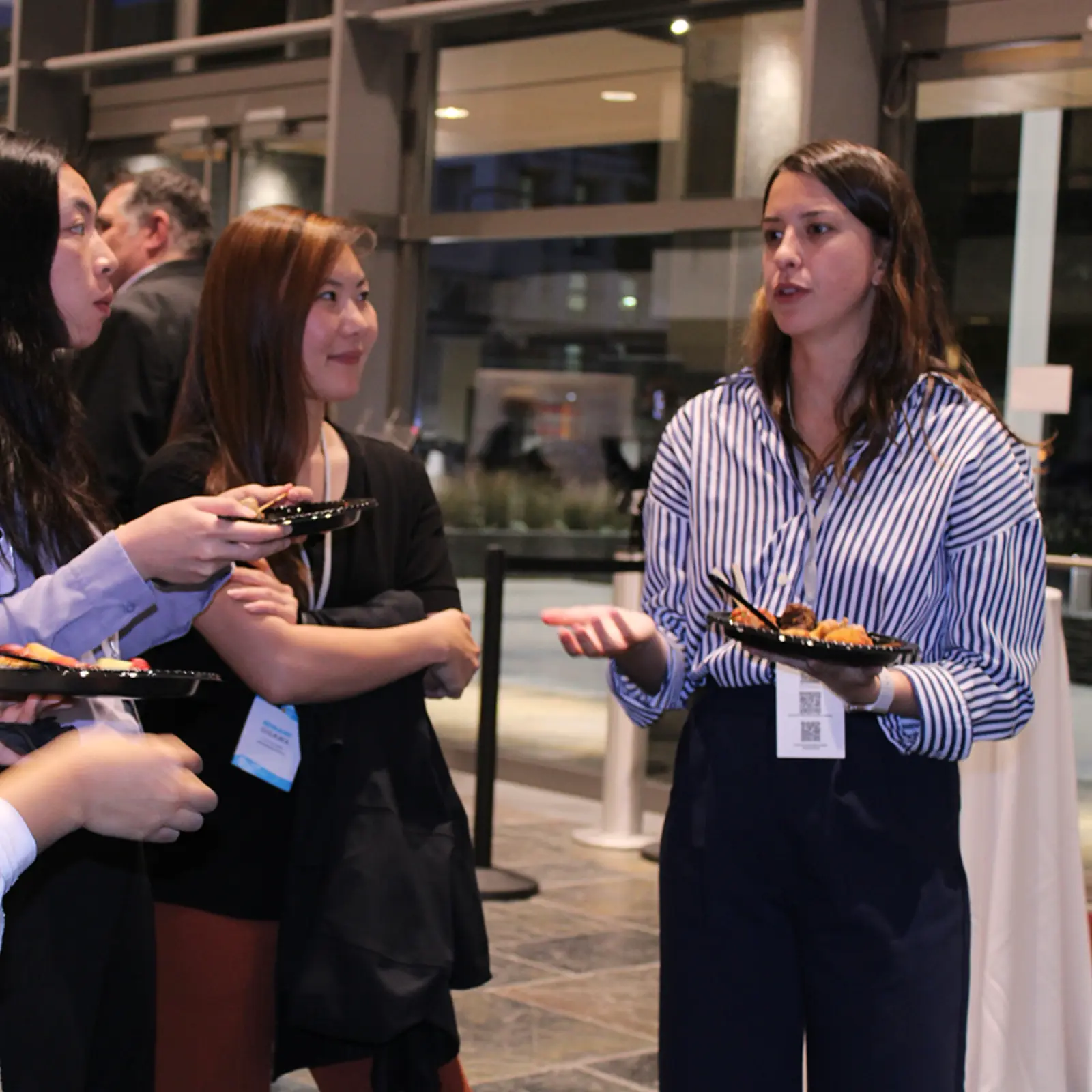 Group of women talking at an event