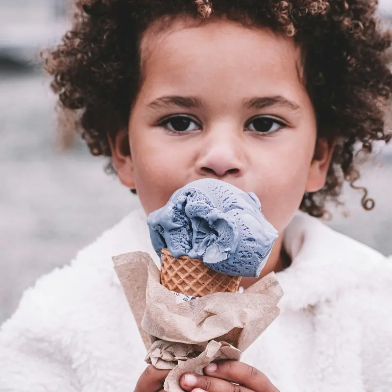 Child eating an ice cream cone