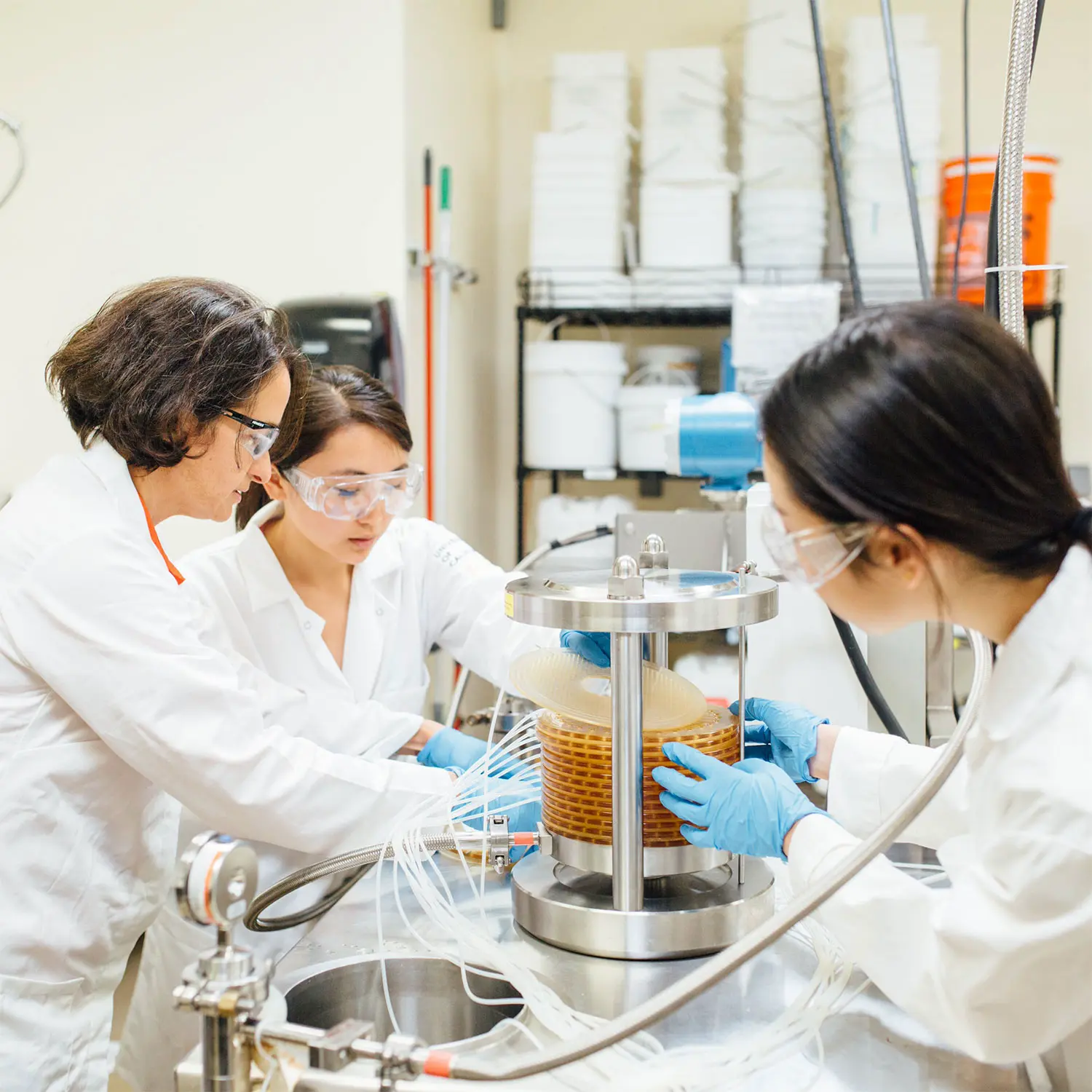 Group of scientists performing tests in a lab