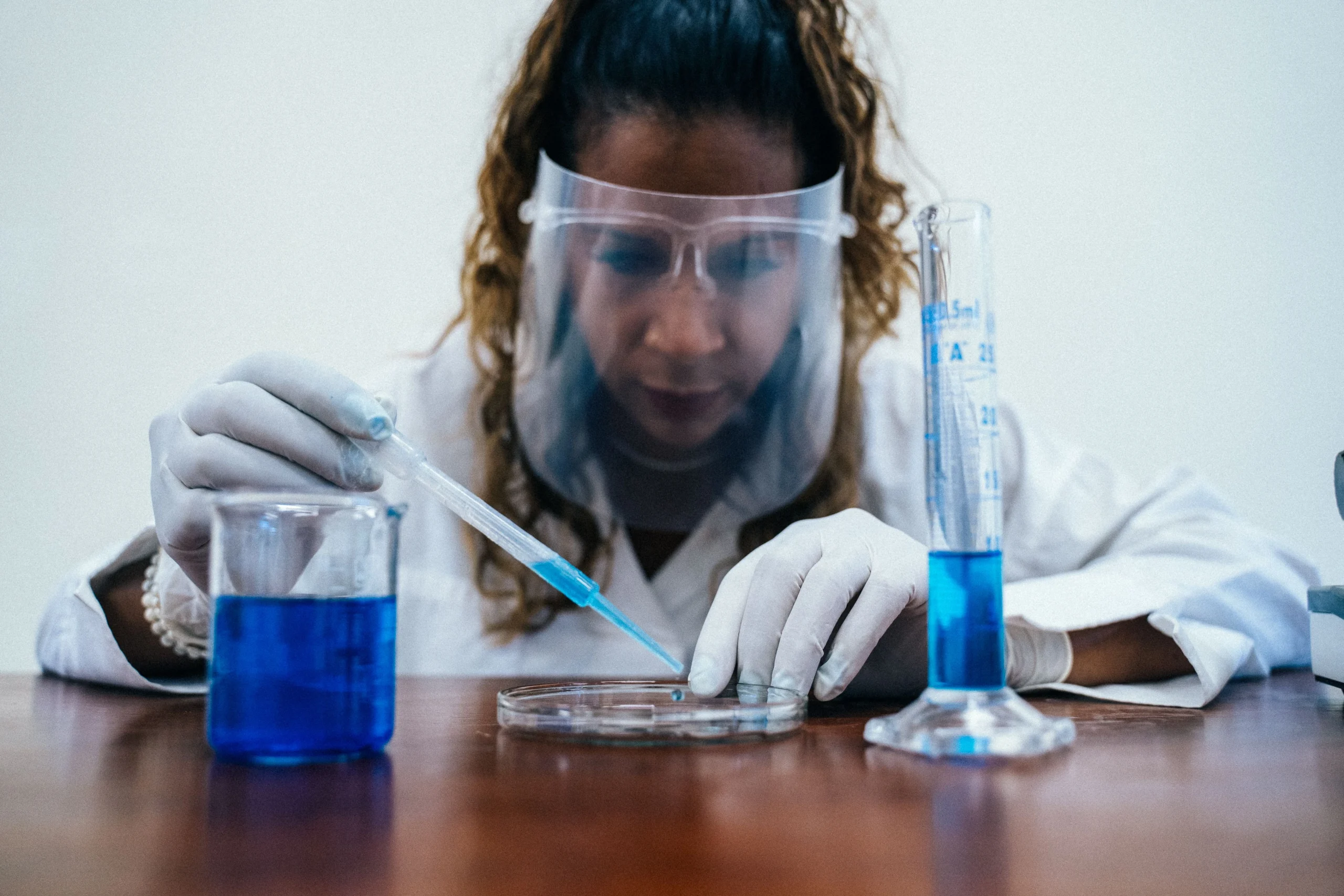 Scientist working with petri dish