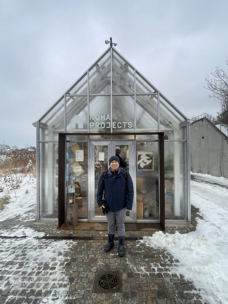 Lik in front of Noma projects greenhouse